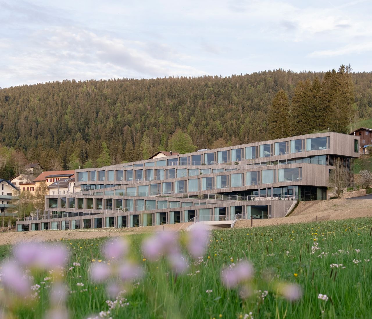 exterior of BIG&#039;s new Hôtel des Horlogers for Audemars Piguet