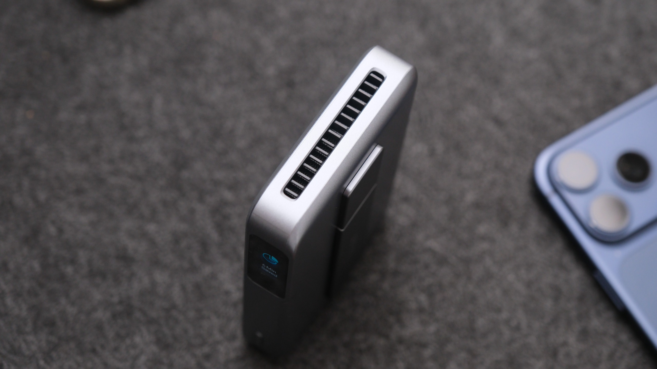 Close-up of the Anker MagGo Power Bank 2 Pro standing upright, showing the cooling vent along its top edge.
