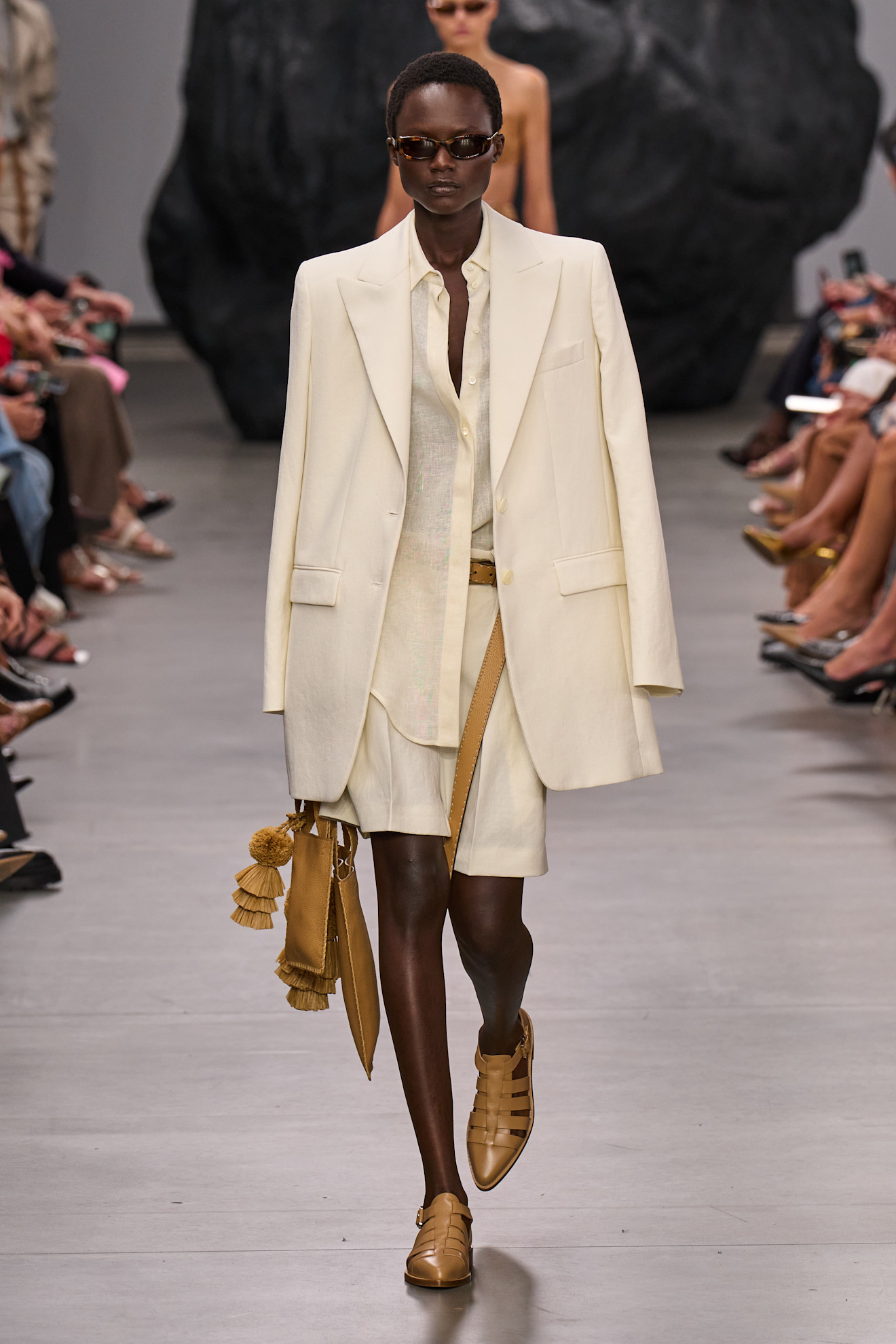 Summer Shoe Trends 2025: A model wears fisherman sandals on the Michael Kors spring/summer 2025 runway