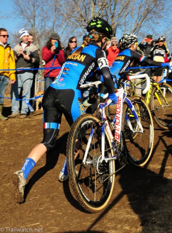 Kaitlin Antonneau (Marian University) behind Rivera on lap one