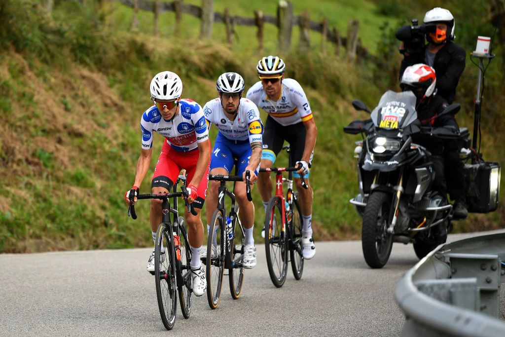 ALTODELANGLIRU SPAIN NOVEMBER 01 Luis Leon Sanchez Gil of Spain and Astana Pro Team Mattia Cattaneo of Italy and Team Deceuninck QuickStep Guillaume Martin of France and Team Cofidis Solutions Credits Polka Dot Mountain Jersey Breakaway during the 75th Tour of Spain 2020 Stage 12 a 1094km stage from Pola de Laviana to Alto de lAngliru 1560m lavuelta LaVuelta20 La Vuelta on November 01 2020 in Alto de lAngliru Spain Photo by David RamosGetty Images
