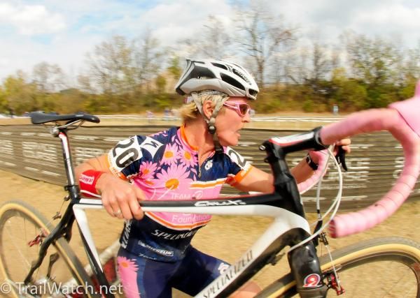 Tammy Wallace (Thinkcash racing) over the barriers.
