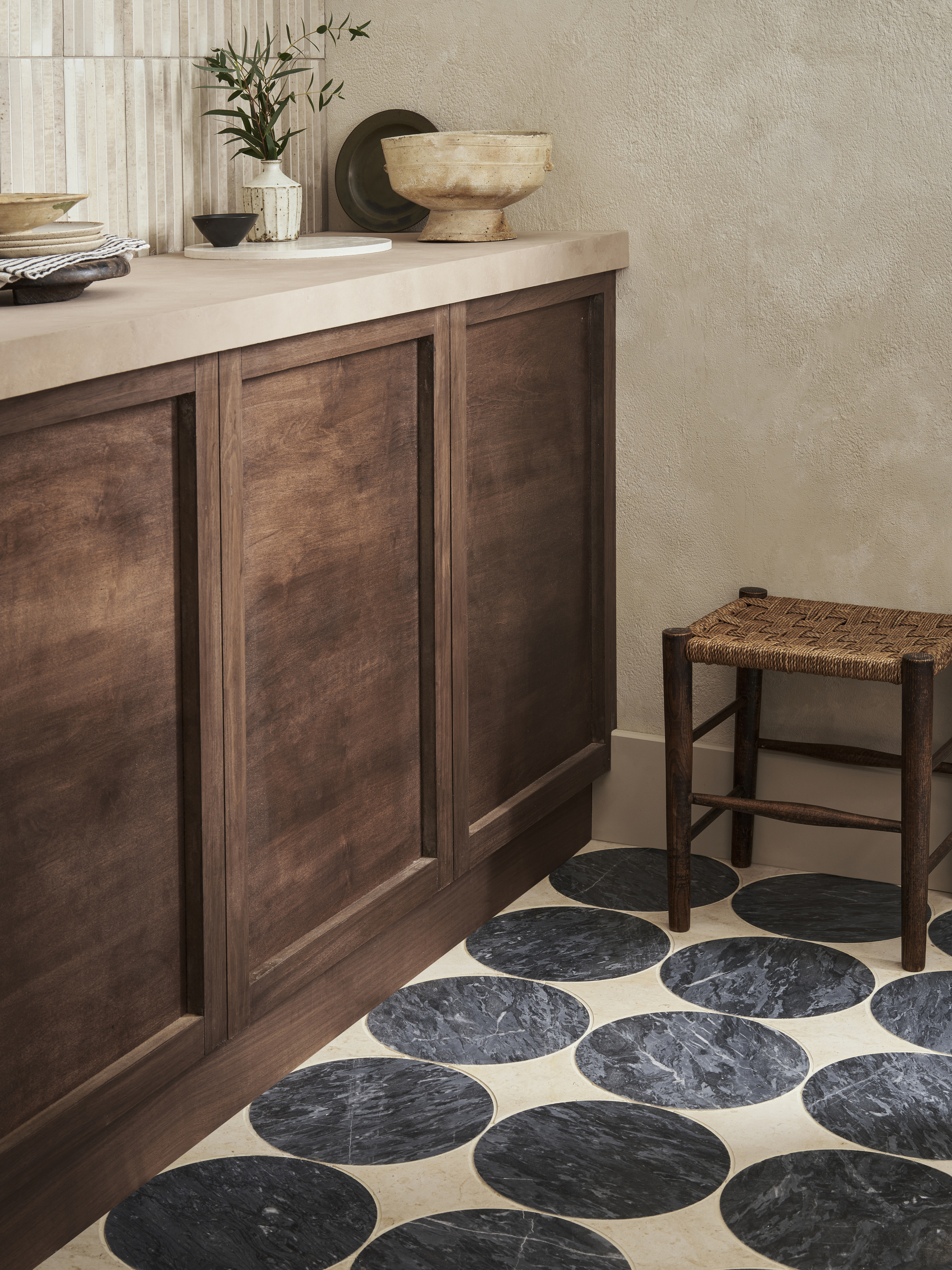 A bathroom with large, round tiles