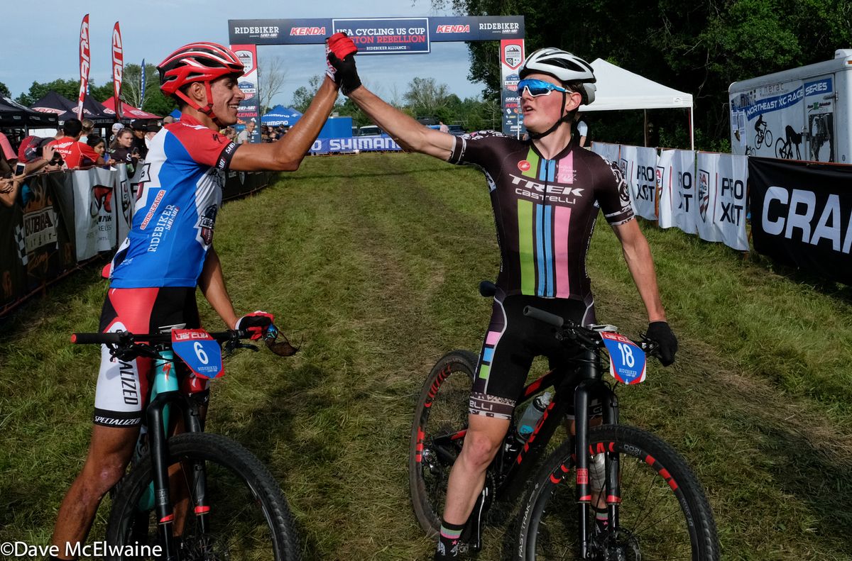 Sandy Floren (Trek) finishing third, congratulates Chris Blevins at the finish