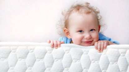 Baby on memory foam mattress