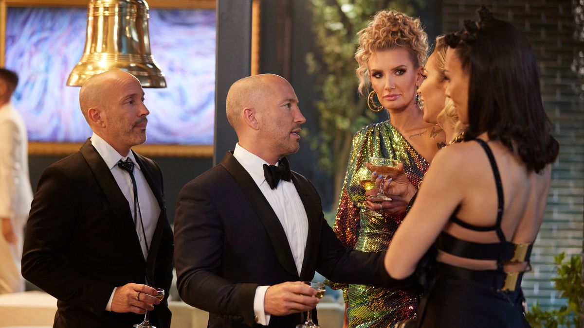 Brett Oppenheim, Jason Oppenheim, Nicole Young, Mary Fitzgerald and Bre Tiesi gathered around in black tie gear in Selling Sunset season 7