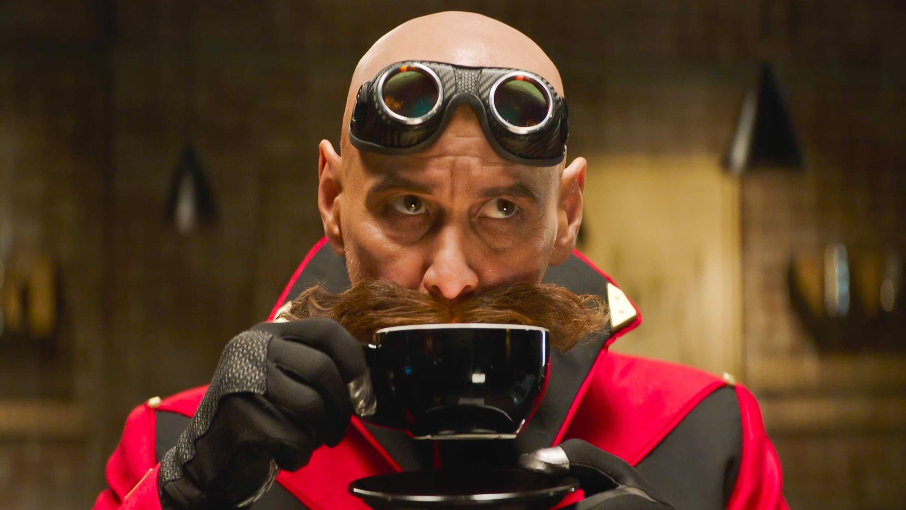 Dr. Robotnik (Jim Carrey) sips from a cup of tea in a scene from "Sonic 2"