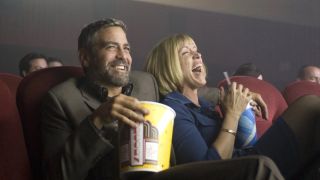George Clooney and Frances McDormand seeing movie in Burn After Reading