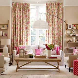 Living room in brown and pink color scheme, with grandmillennial twist