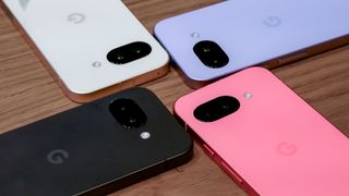 Google Pixel 9a in different colors arranged to show Gemini logo.