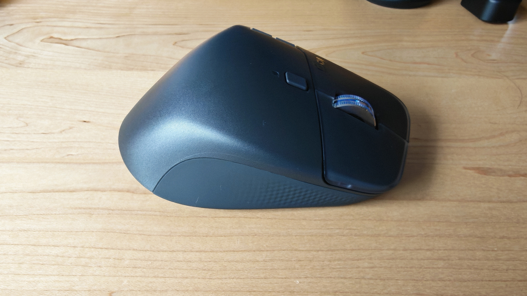 The Logitech MX Master 4 mouse, from different angles.