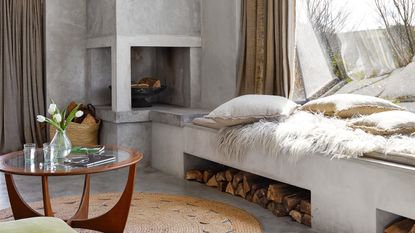 Concrete corner fireplace in living room