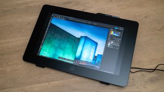 XPPen Artist Pro 24 (Gen 2) 4K drawing tablet on a wooden surface