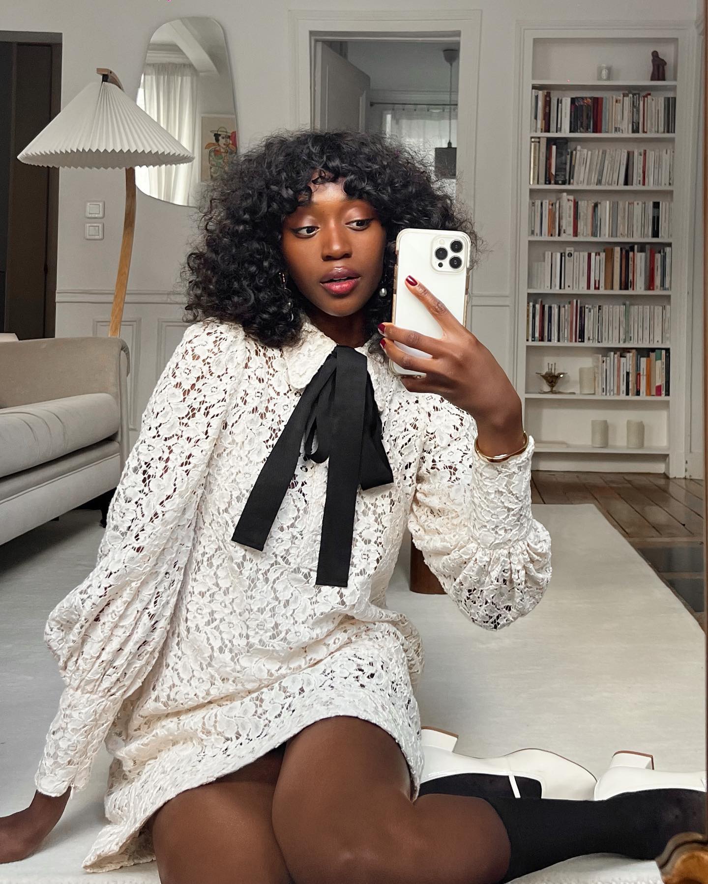 Influencer wears dress with elongated sleeves
