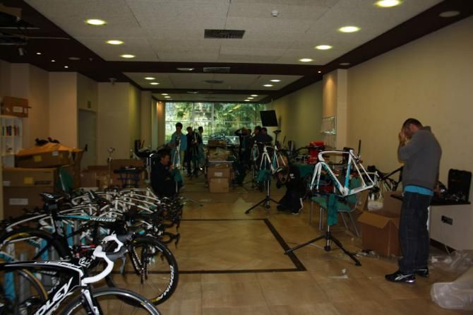 The Astana mechanics are hard at work with the 2014 bikes