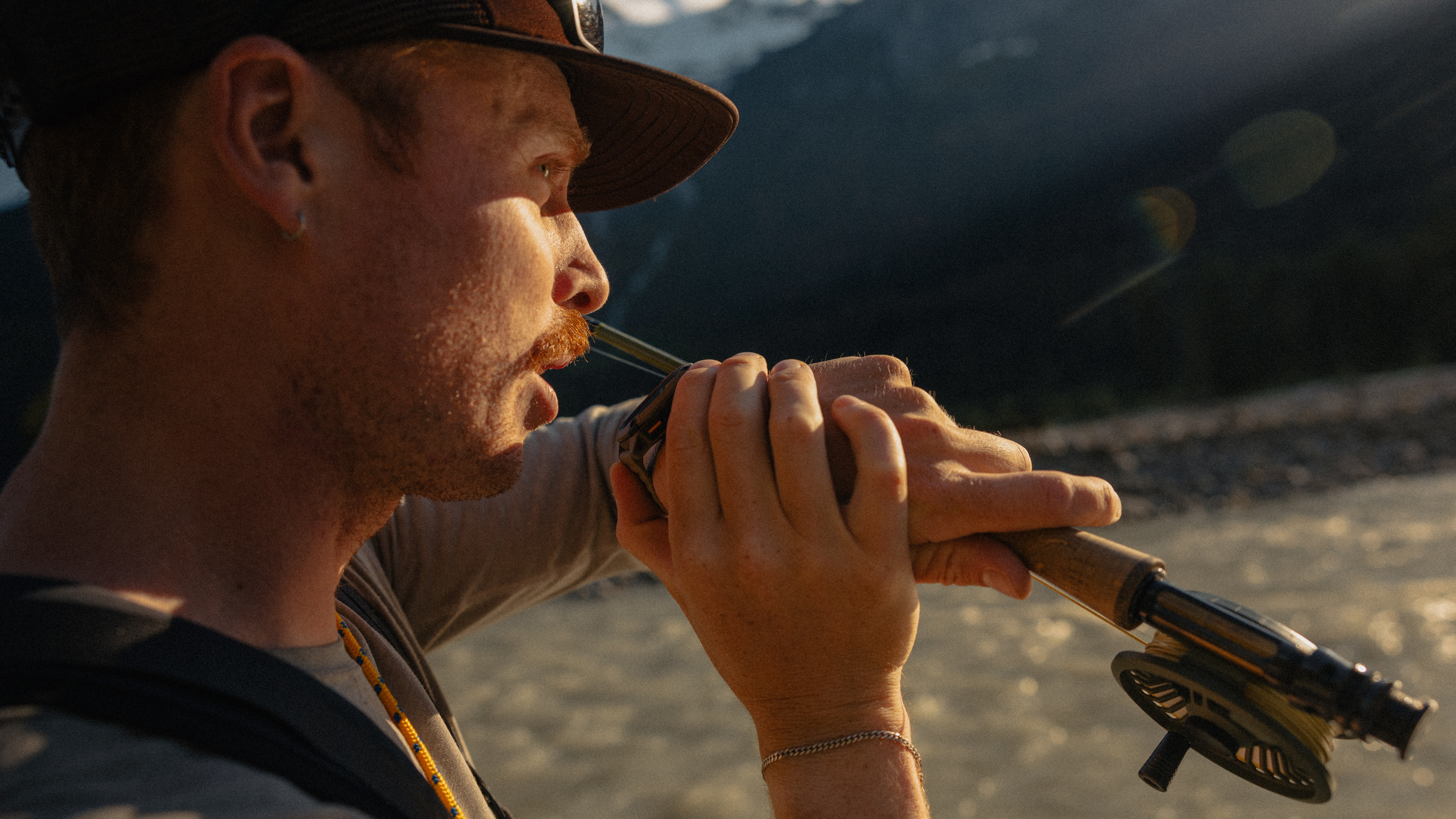 Angler using voice control on the Coros Nomad