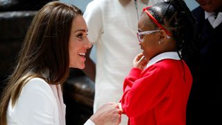 Kate Middleton with a schoolgirl