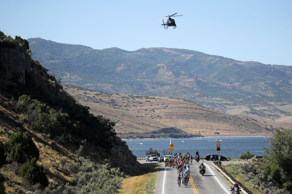 A helicopter flies over the peloton during stage 5 at the Tour of Utah