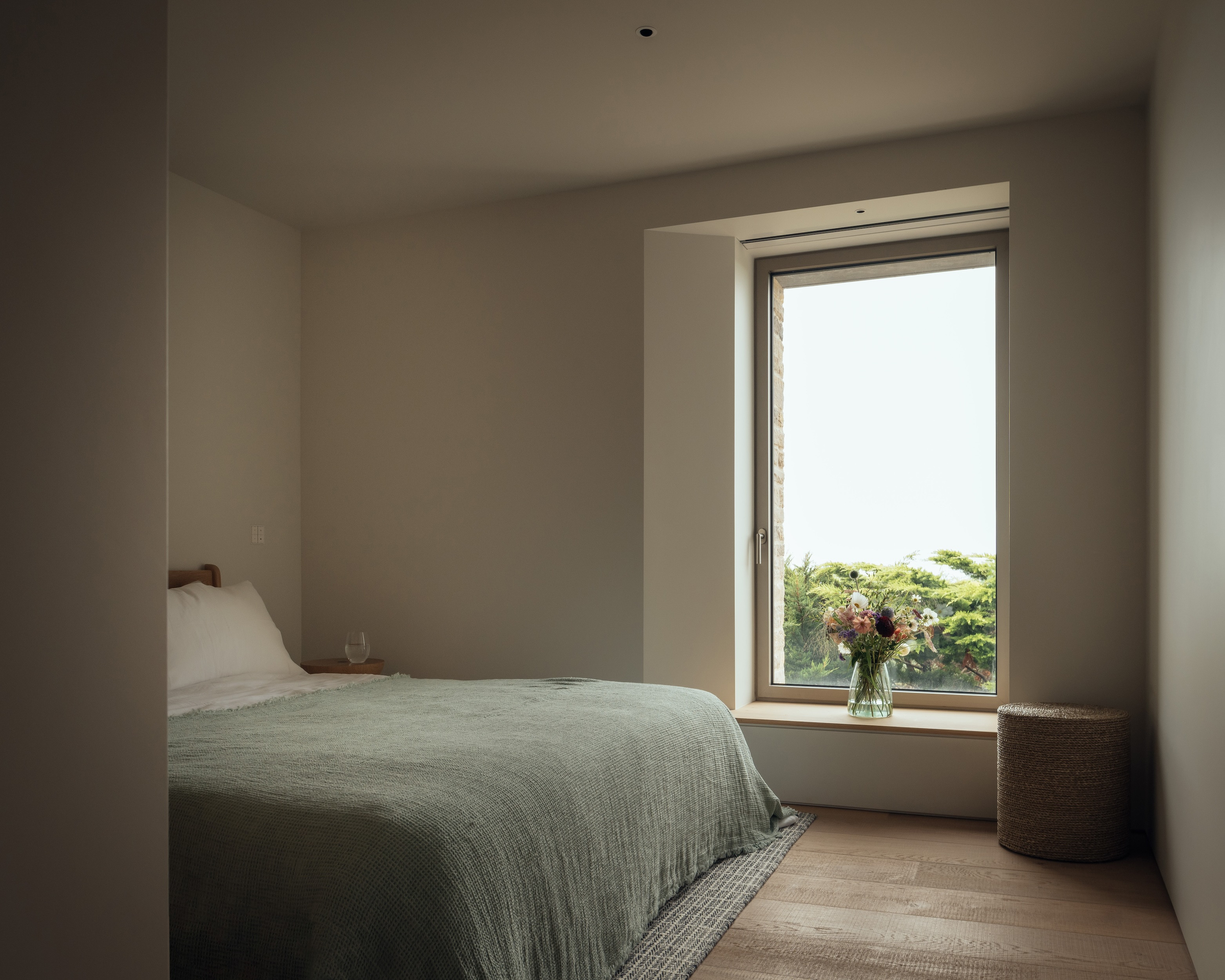 Another one of the house&#039;s simple, monastic bedrooms
