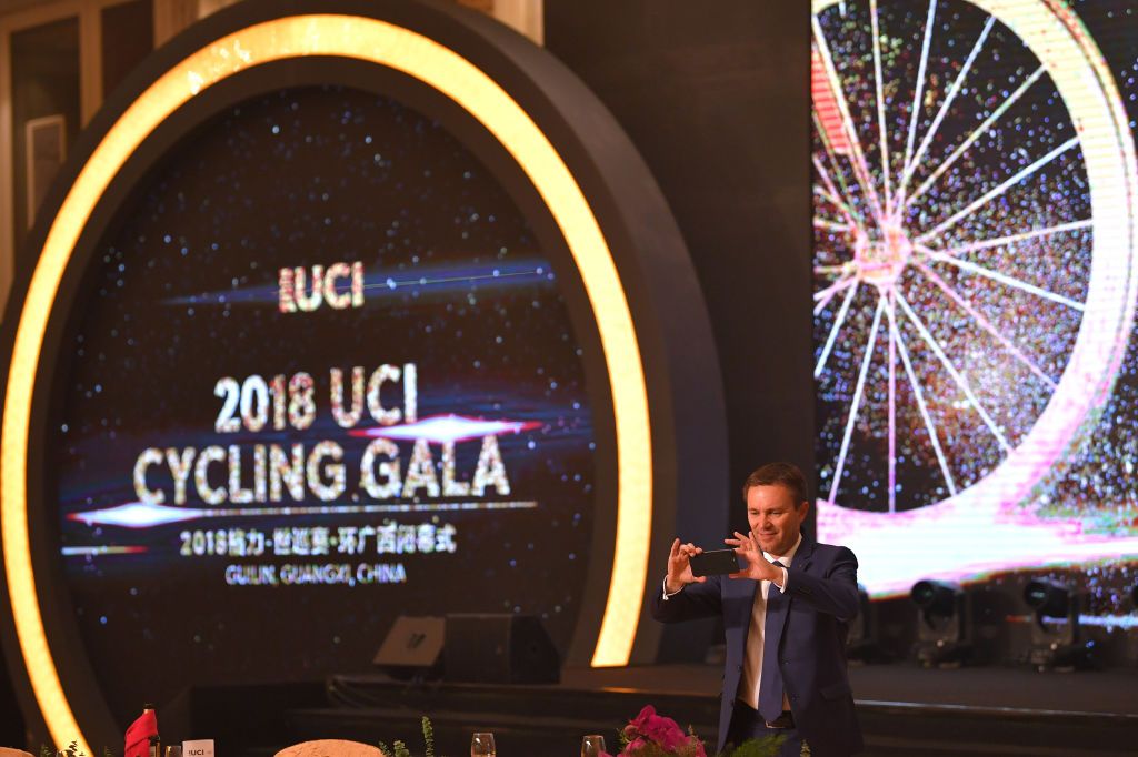 UCI President David Lappartient grabs some snaps