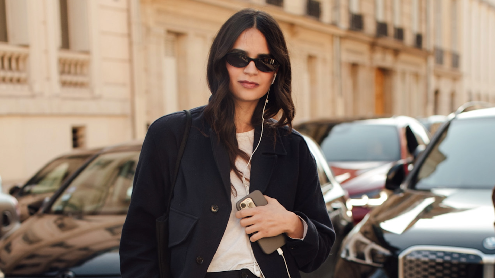 woman wearing a blazer and a white T-shirt 