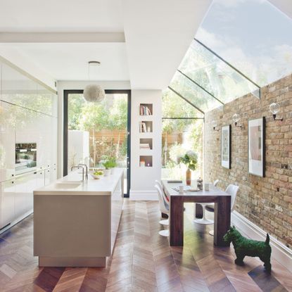Side return kitchen extension with rooflights picture window and large patio door to flood the space with light