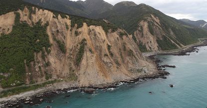 Huge slips, caused by the 7.5 earthquake, are seen blocking State Highway One north of Kaikoura on November 14, 2016 in New Zealand