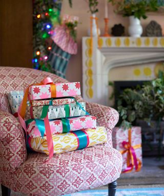 gifts wrapped in colorful hand-block-printed paper by Molly Mahon