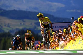 MEGEVE FRANCE JULY 12 Tadej Pogacar of Slovenia and UAE Team Emirates Yellow Leader Jersey crosses the finish line during the 109th Tour de France 2022 Stage 10 a 1481km stage from Morzine to Megve 1435m TDF2022 WorldTour on July 12 2022 in Megeve France Photo by Tim de WaeleGetty Images