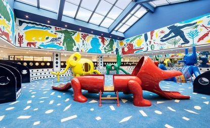 View of MOKA playground by Jaime Hayon featuring sausage dog slide
