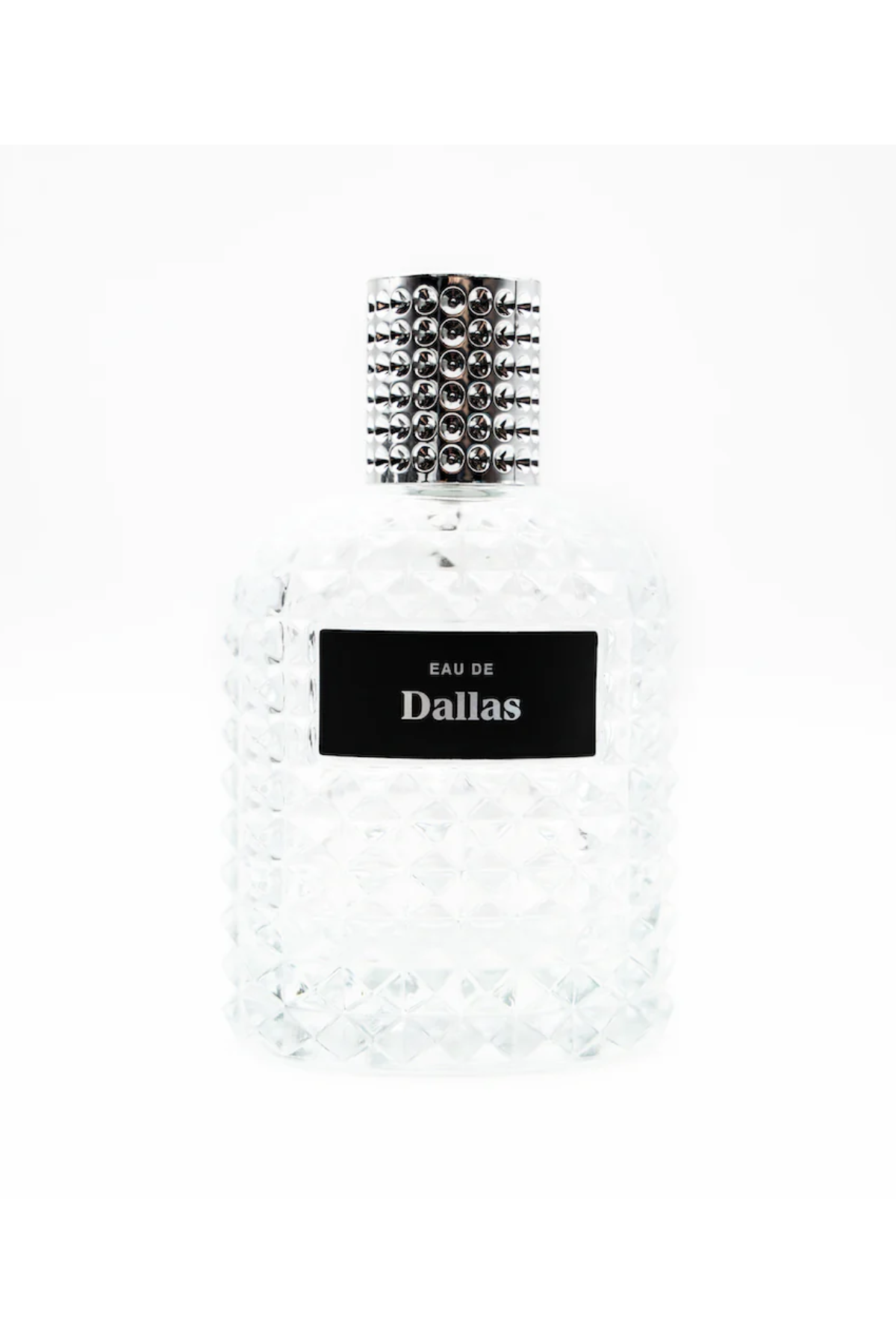 A bottle of Zodica Eau de Dallas perfume against a white background.