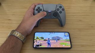 Playing Fortnite on the Poco F6 Pro using the DualSense controller