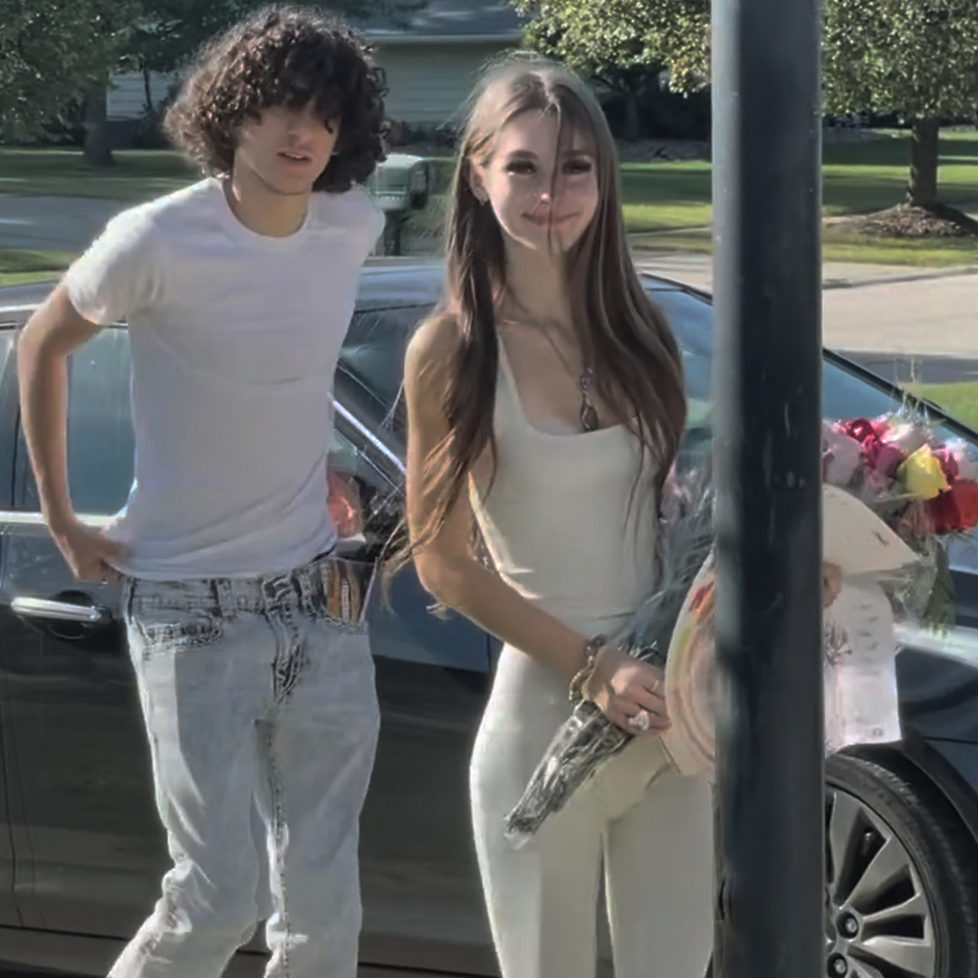 mackenzie Shirilla and Dominic russo posing together as she holds flowers next to her car in a still featured in the documentary the crash