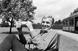 England captain Bobby Moore relaxes with a cup of tea the day before the 1966 World Cup final