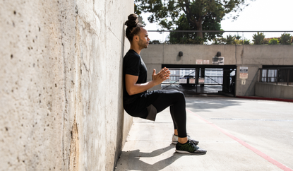 Man doing wall sit