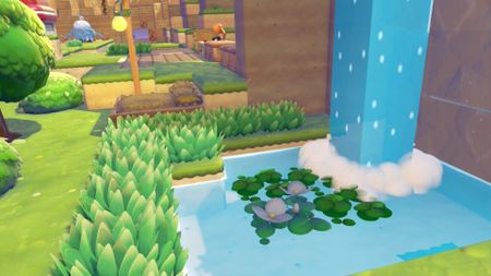 A scenic shot of duckweed growing under a waterfall in Pokemon Pokopia