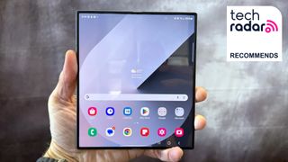 Samsung Galaxy Z Fold 6 open in hand with TechRadar recommends badge