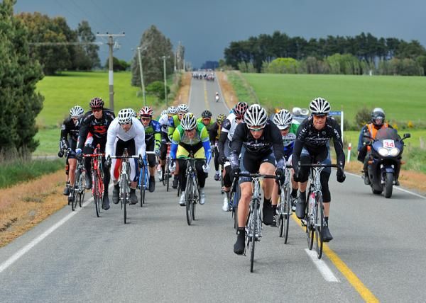 The peloton has split into three bunches