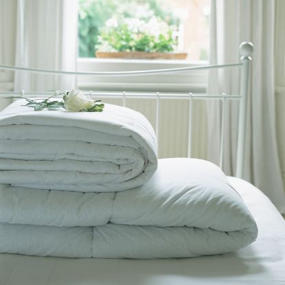 Duvets on a white bed