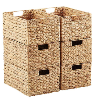 Stackable wicker storage baskets.