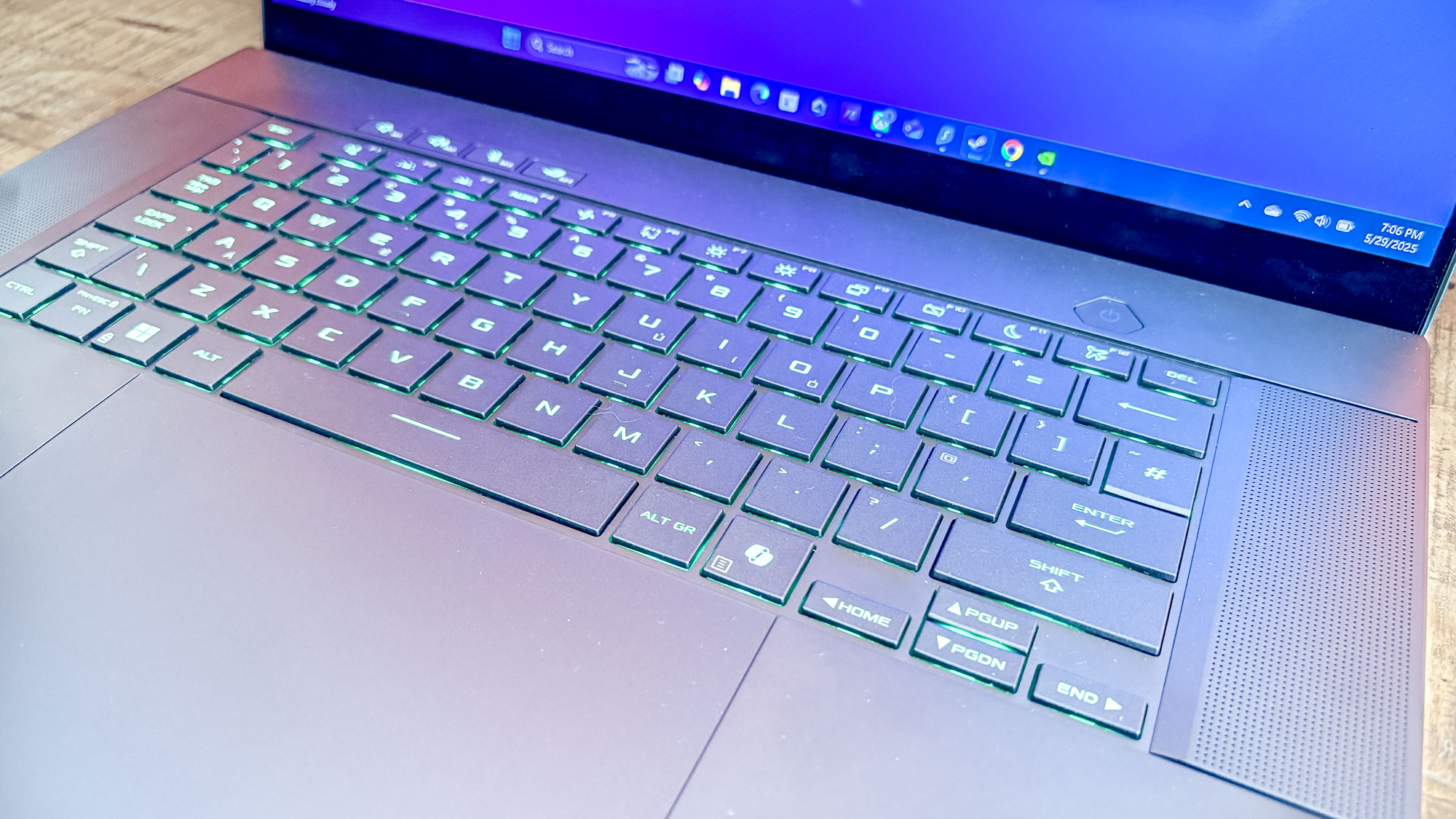 Asus ROG Zephyrus G16 on table with close up on keyboard