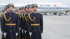 Soldiers line up to welcome China's president, Xi Jinping, as his plane touches down for the 16th Brics summit, in Russia