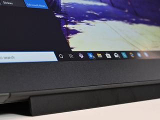 The ThinkVision M14 has a pop-up stand to help match your laptop