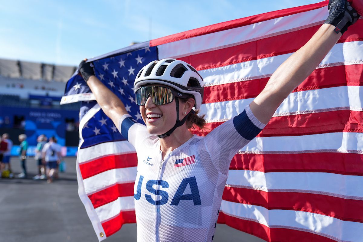 Picture by Zac Williams/SWpix.com - 04/08/2024 - Paris 2024 Olympic Games - Cycling Road - Trocadero-Trocadero (158.0km) - Paris, France - Women&acirc;&euro;&trade;s Road Race - Kristen Faulkner (USA) celebrates winning the Women's Road Race to become Olympic Champion