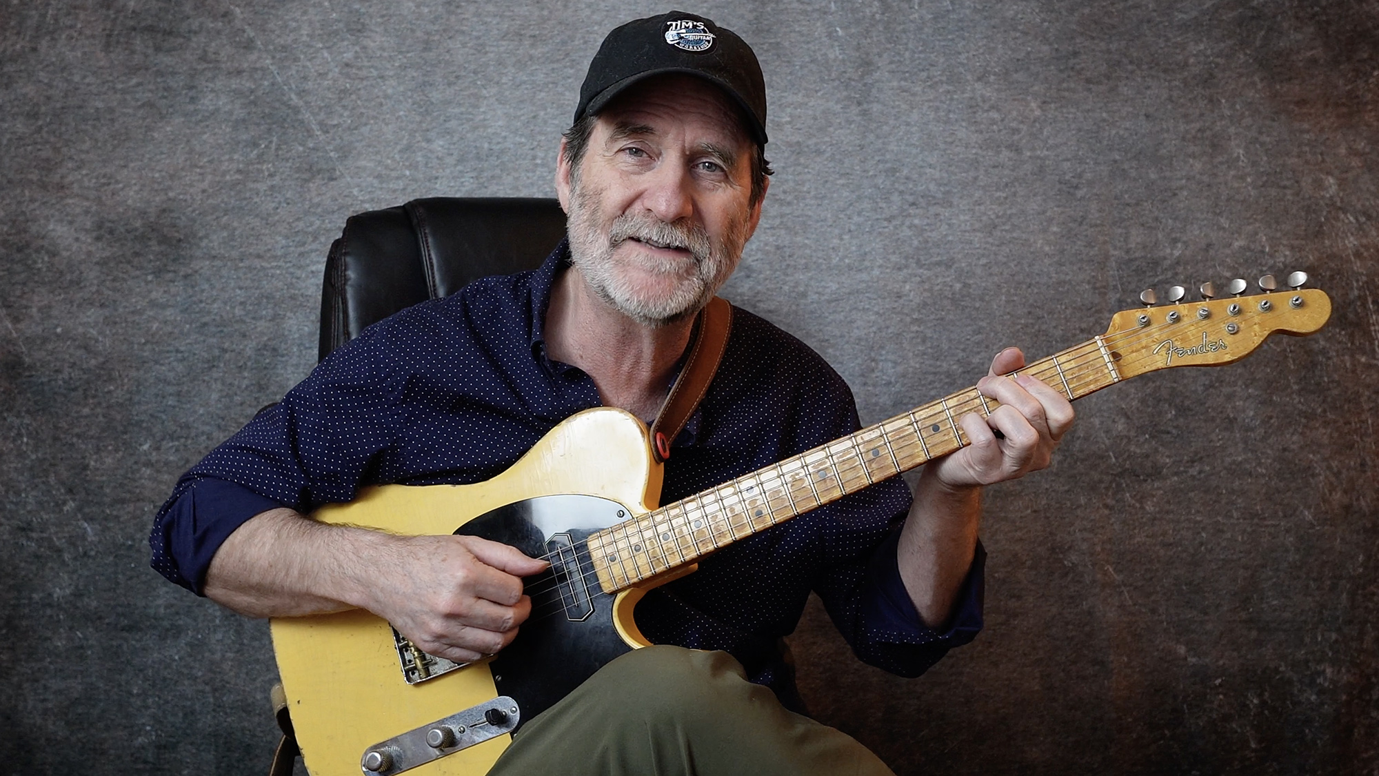A photo of guitarist Tim Lerch holding a 2000 Fender Custom Shop ’51 Nocaster Relic Reissue