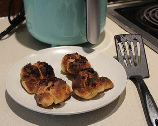 Cooked garlic knots made using the Dash 2-quart air fryer