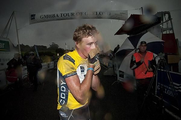Just about sums it up: Tour winner Rohan Dennis (Team Jayco Skins) cleans himself up after another wet,cold and hazardous day in the saddle. The tour endured miserable weather conditions all week.