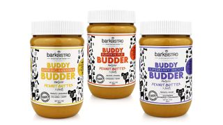 three jars of Buddy Budder Peanut Butter, one of w&h's picks for Christmas gifts for dogs