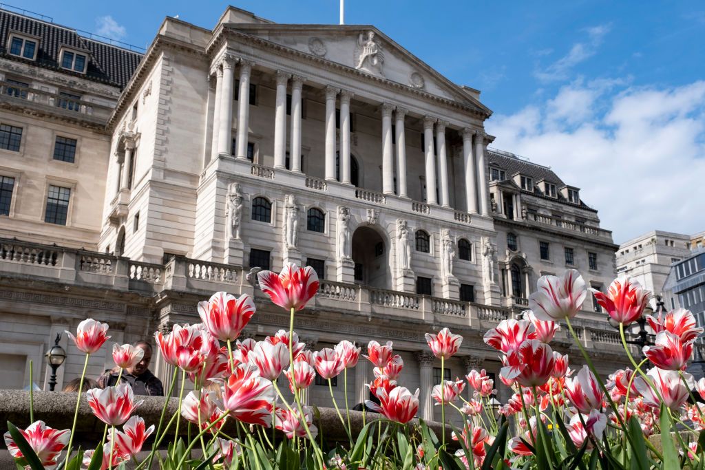 Variegated tulips planted in flower beds opposite the Bank of England in the City of London o