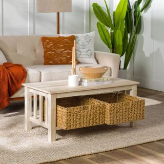 Saracina Home Mission Coffee Table with Woven Baskets in neutral living room with a plant in the corner